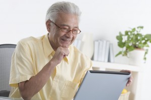 Senior Man Using Laptop